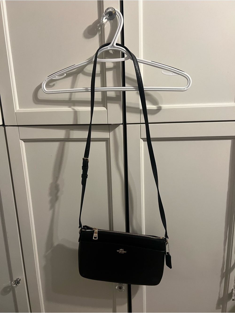 Coach shoulder or body bag. Used once- in pristine condition.